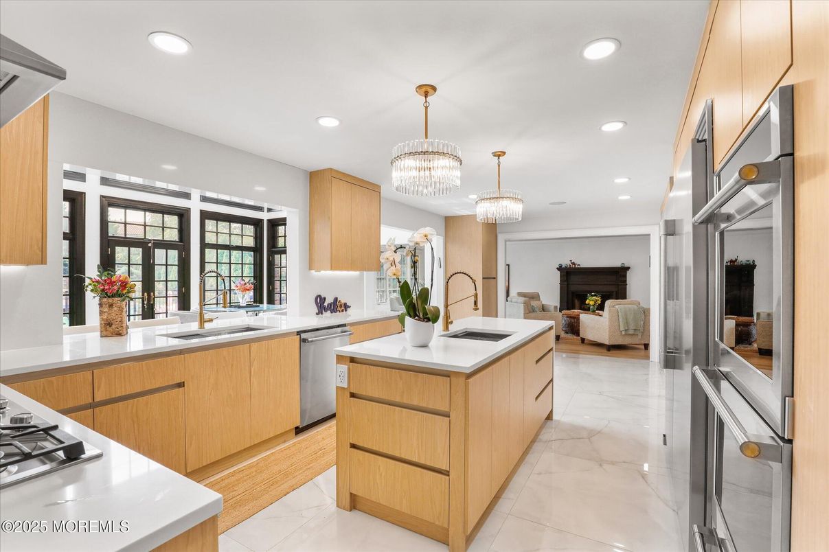 Chandelier, Fireplace, Interior, Kitchen, Living room, Marble, Recessed Lighting, Stainless Steel Appliances