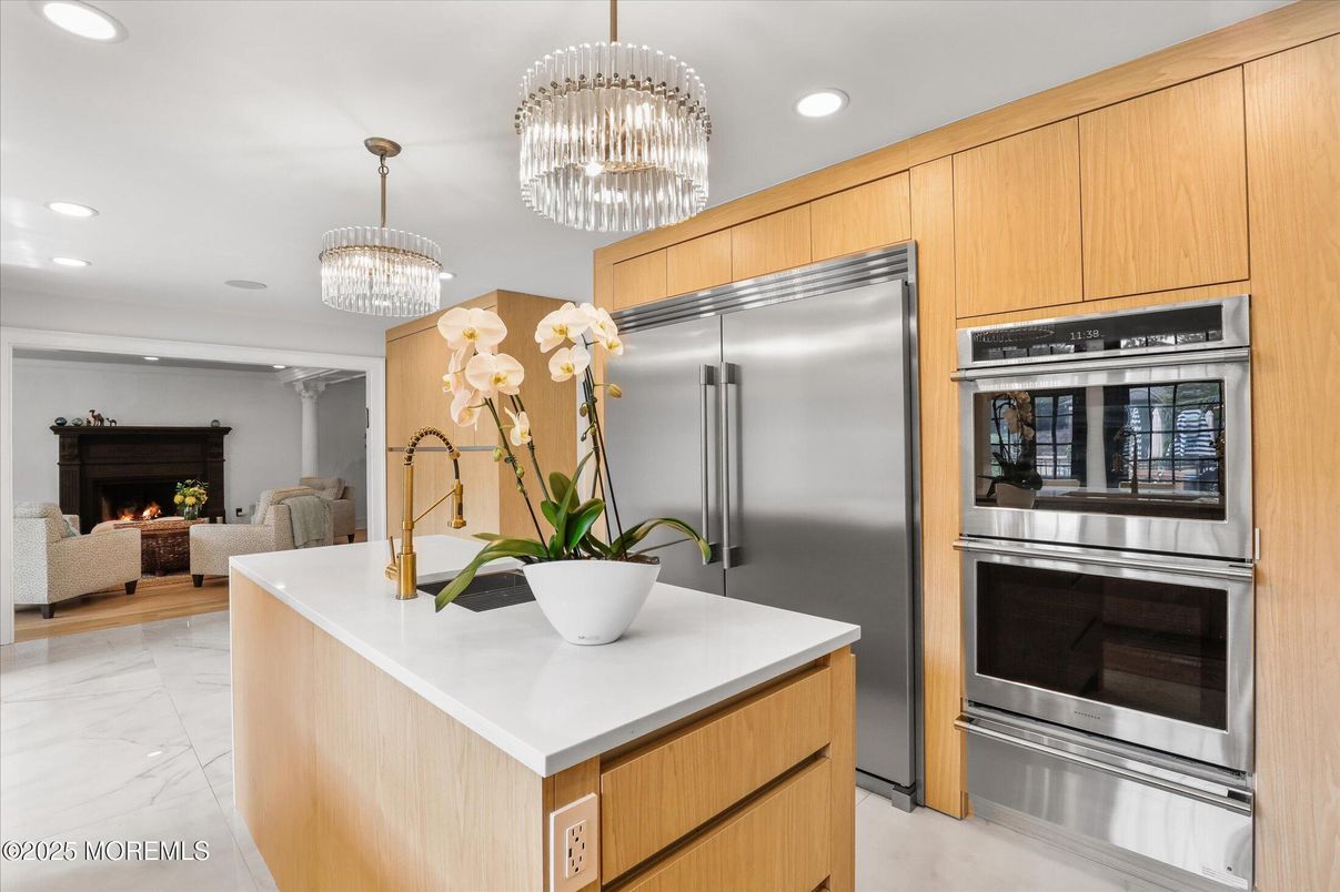 Chandelier, Fireplace, Interior, Kitchen, Living room, Marble, Recessed Lighting, Stainless Steel Appliances