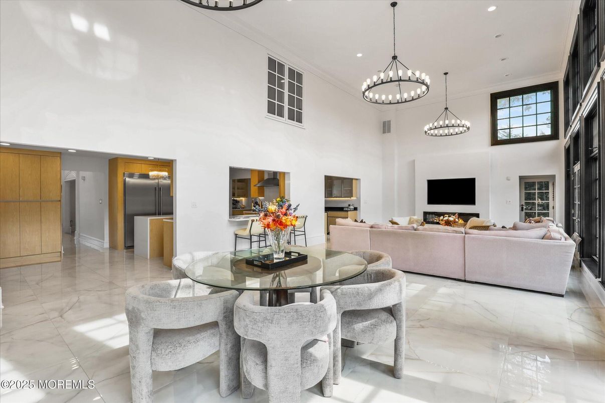 Chandelier, Dining room, Fireplace, Interior, Living room, Marble, Pendant Lights, Recessed Lighting