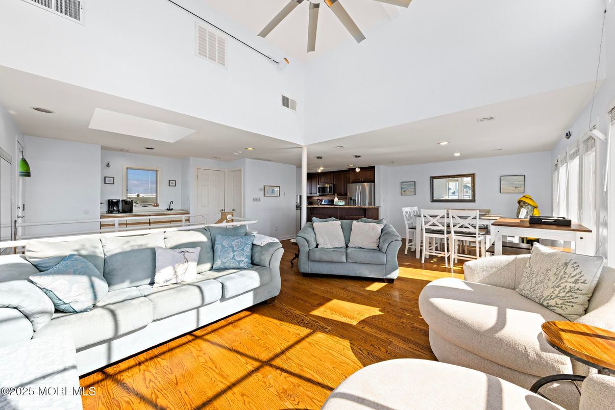 Dining room, Interior, Kitchen, Living room, Recessed Lighting, Stainless Steel Appliances, Wood Texture Flooring