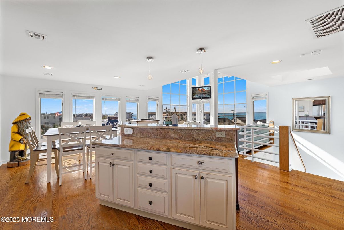 Dining room, Interior, Pendant Lights, Recessed Lighting, Water, Wood Texture Flooring