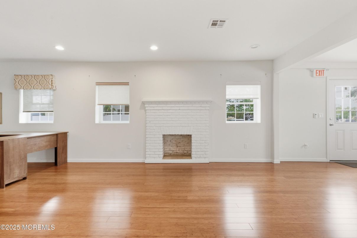 Empty room, Fireplace, Interior, Recessed Lighting, Wood Texture Flooring