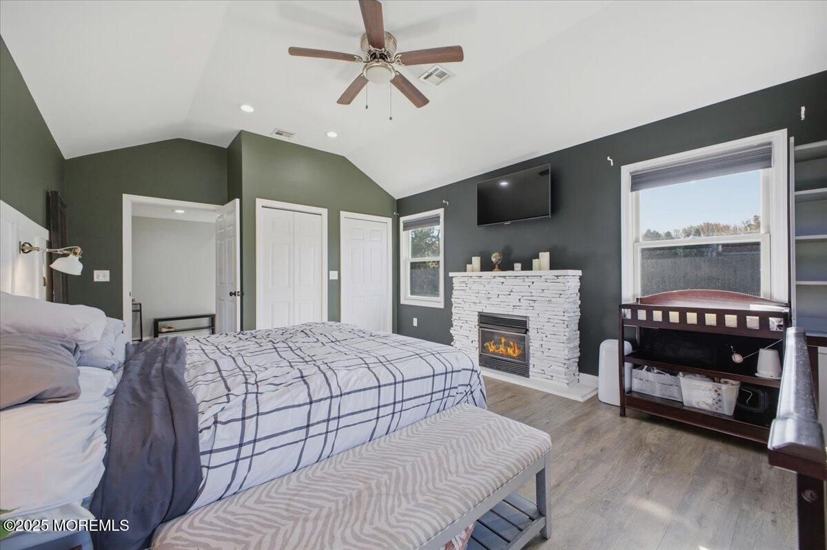 Bedroom, Fireplace, Interior, Recessed Lighting, Wood Texture Flooring