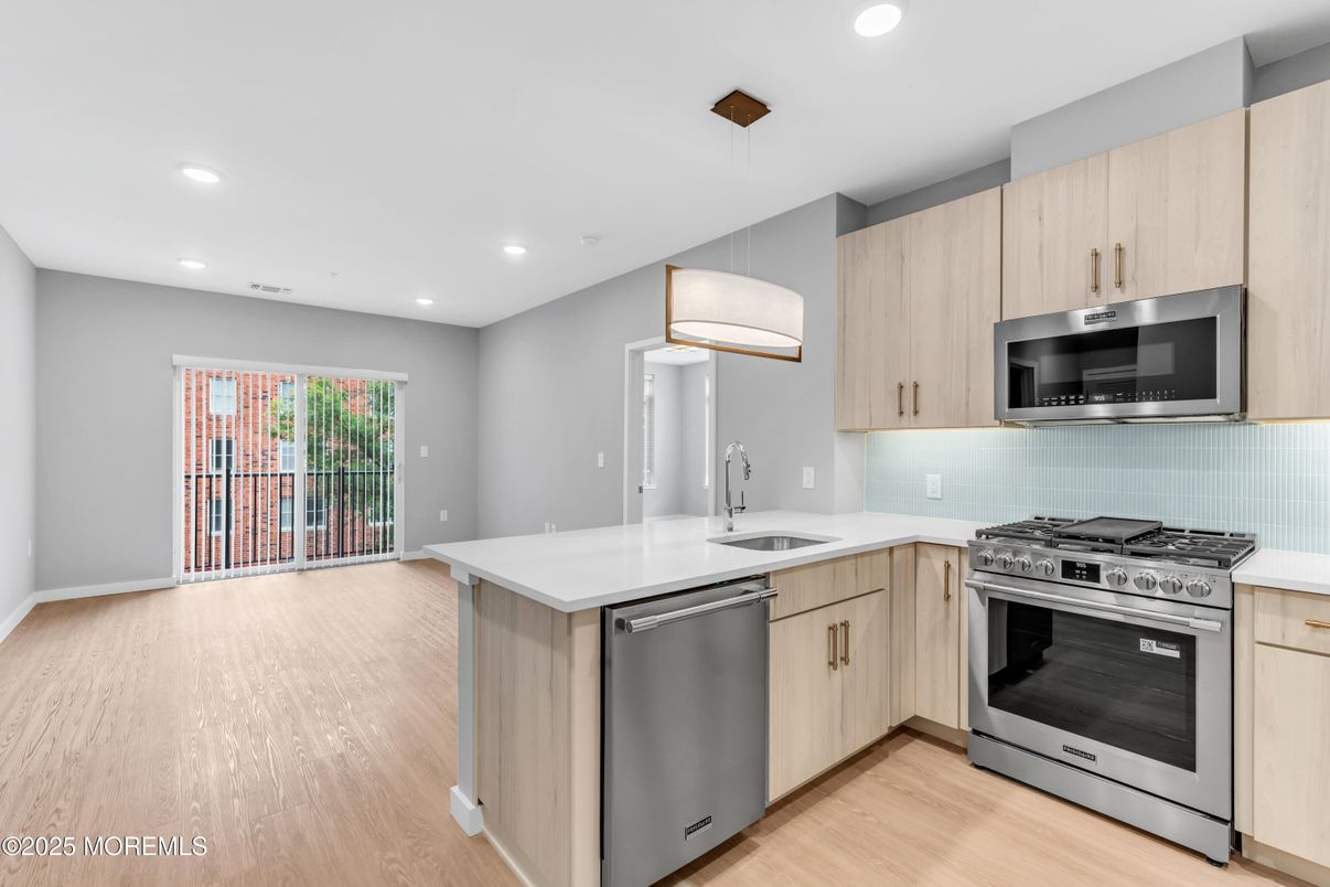 Interior, Kitchen, Pendant Lights, Recessed Lighting, Stainless Steel Appliances, Wood Texture Flooring