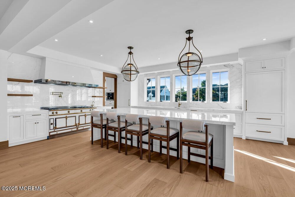Interior, Kitchen, Marble Walls, Pendant Lights, Recessed Lighting, Wood Texture Flooring
