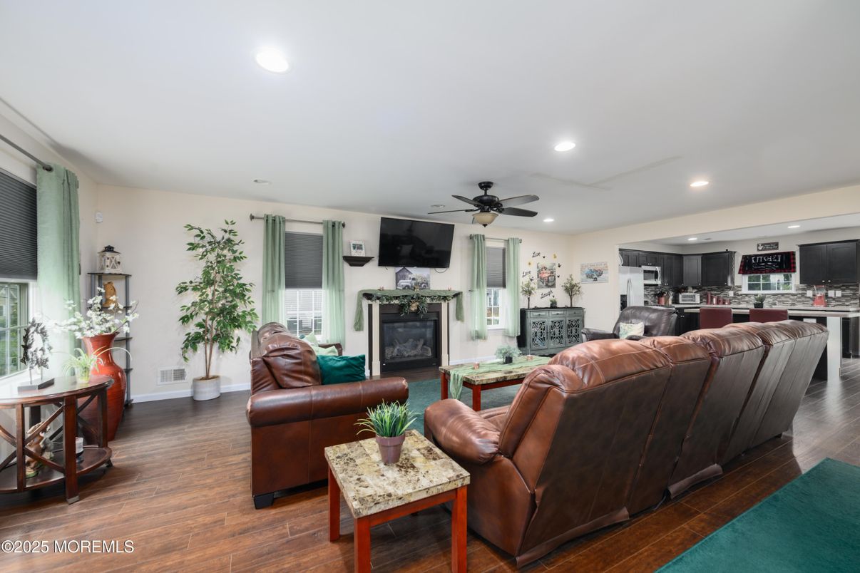 Fireplace, Interior, Kitchen, Living room, Recessed Lighting, Wood Texture Flooring