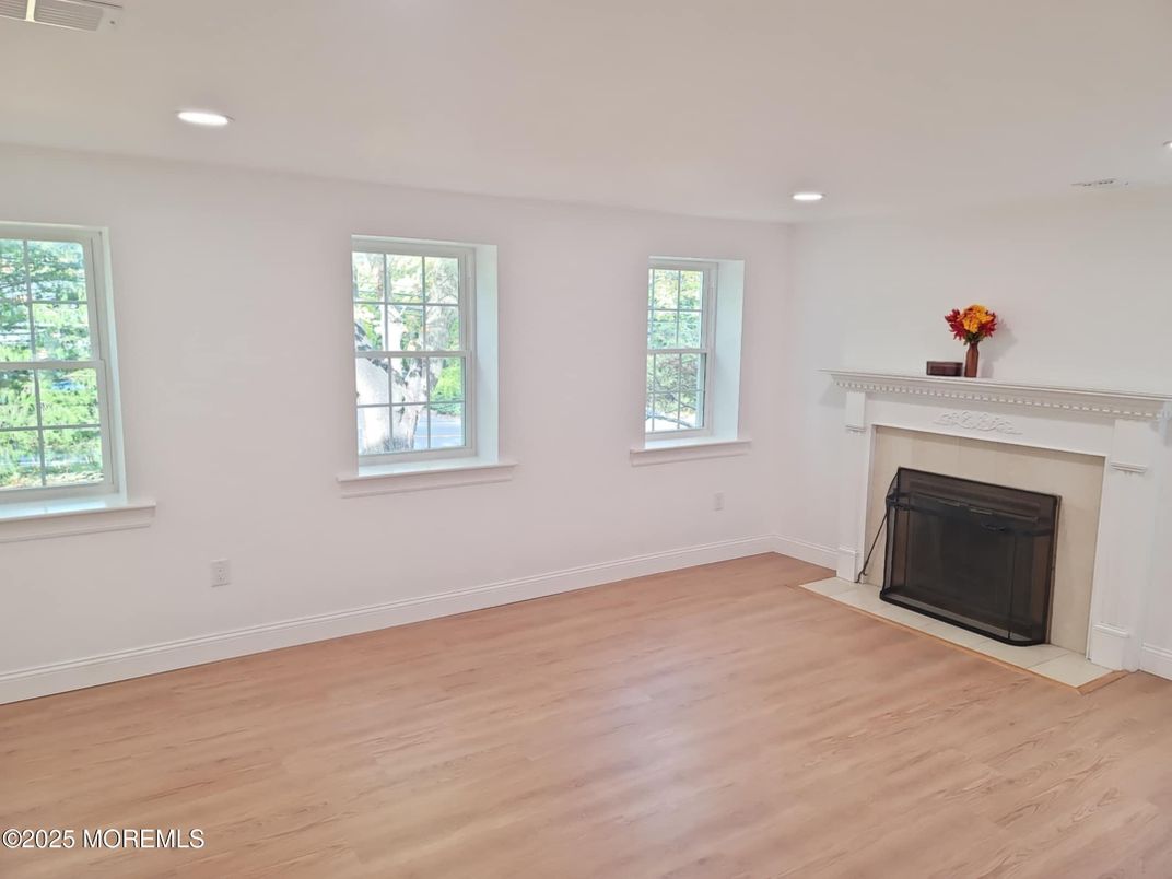 Empty room, Fireplace, Interior, Recessed Lighting, Wood Texture Flooring