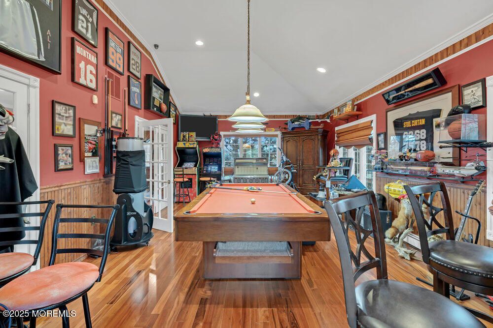 Billiard Table, Fitness Equipment, Game Room, Interior, Pendant Lights, Recessed Lighting, Wood Texture Flooring