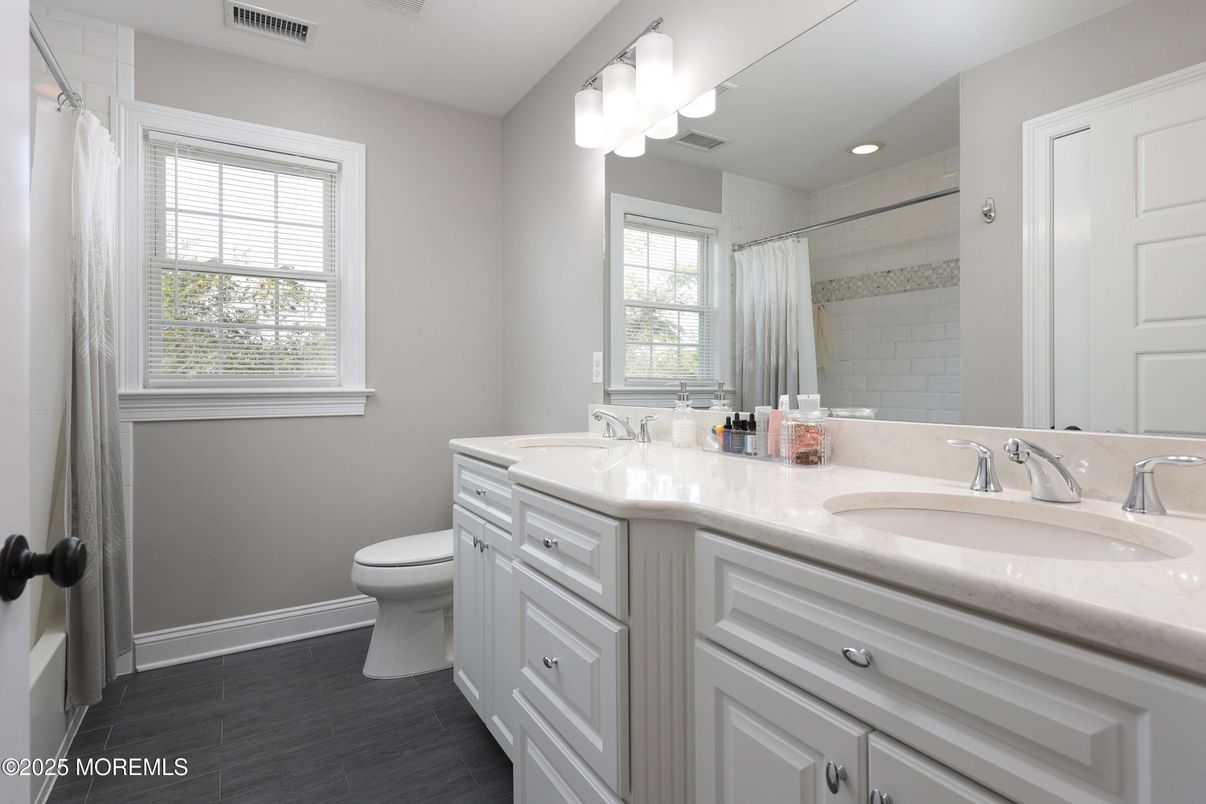 Bathroom, Dual Sink Vanities, Interior, Recessed Lighting, Wood Texture Flooring