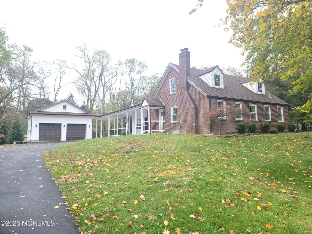 Attached, Exterior, Facade, Brick Facade, Cape Cod