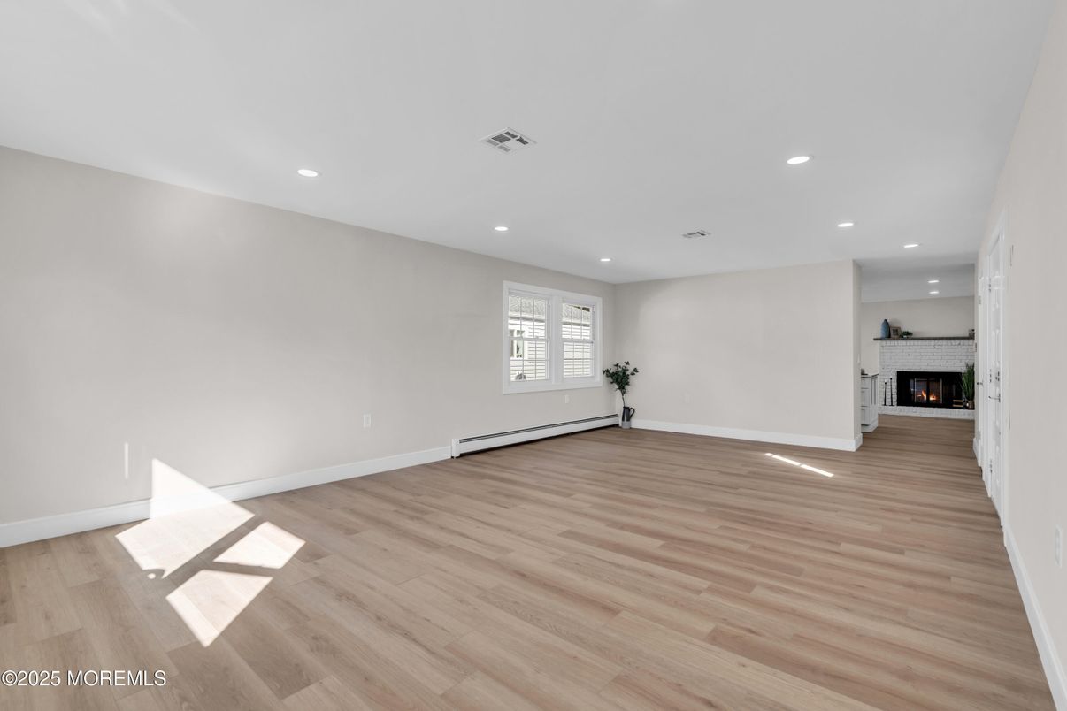Empty room, Fireplace, Interior, Recessed Lighting, Wood Texture Flooring