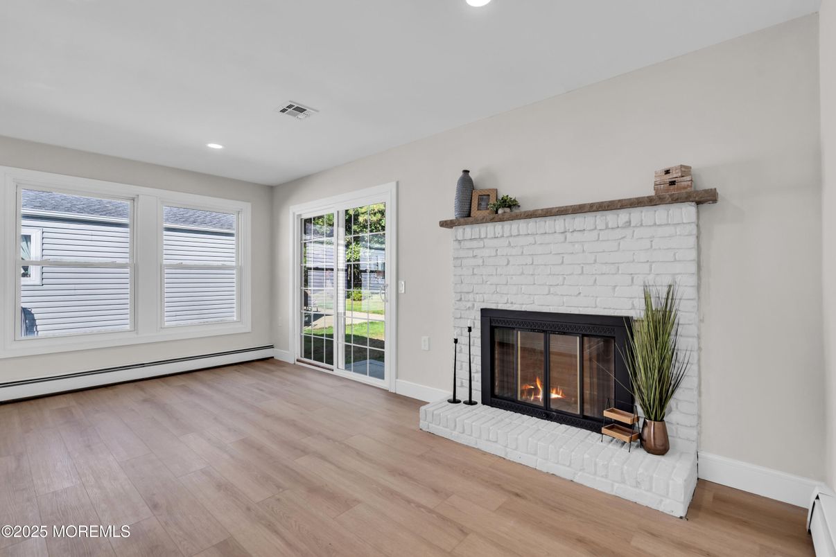 Empty room, Fireplace, Interior, Recessed Lighting, Wood Texture Flooring