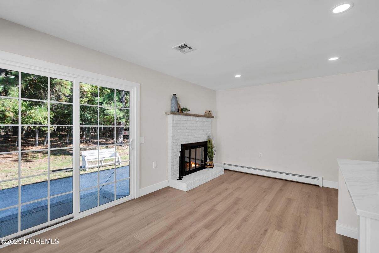 Empty room, Fireplace, Interior, Recessed Lighting, Wood Texture Flooring