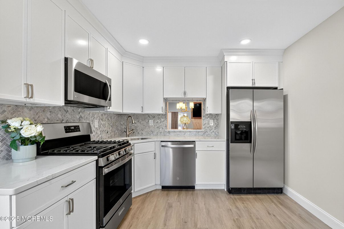 Interior, Kitchen, Recessed Lighting, Stainless Steel Appliances, Wood Texture Flooring