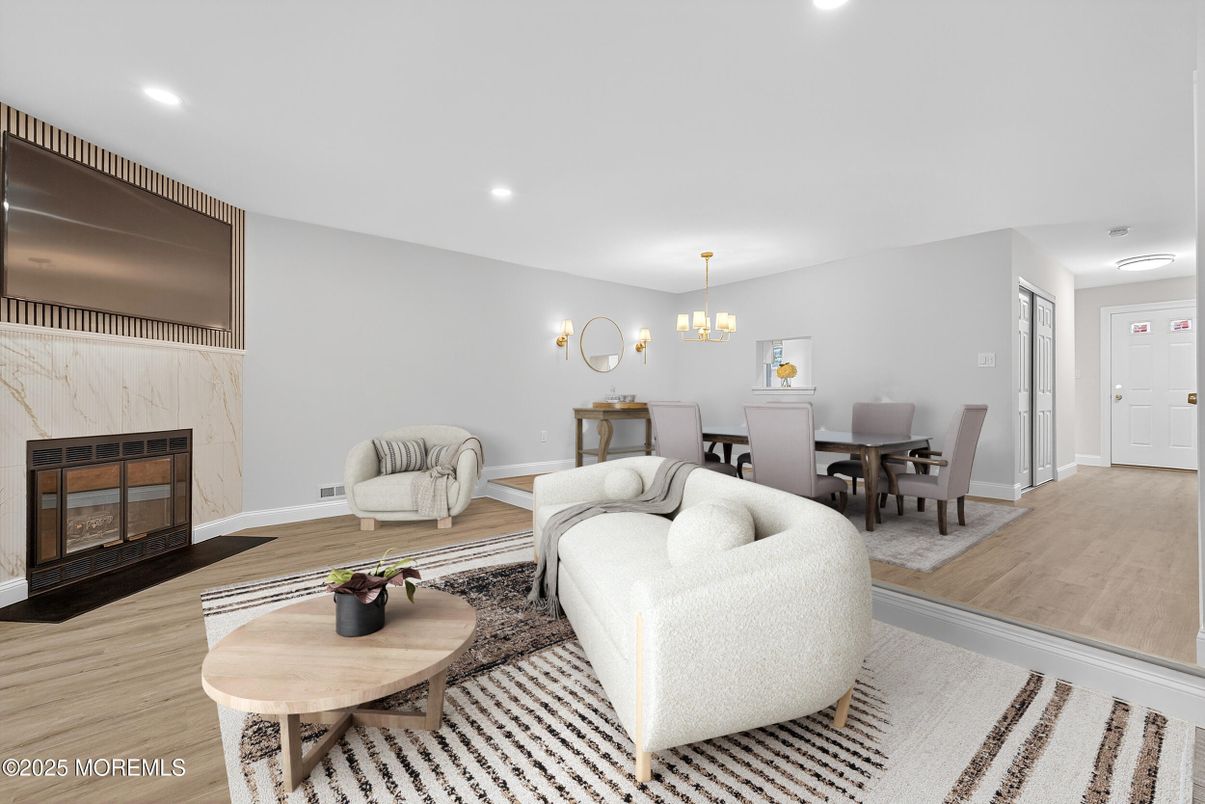 Chandelier, Dining room, Fireplace, Interior, Living room, Recessed Lighting, Wood Texture Flooring