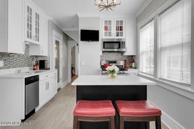 Chandelier, Interior, Kitchen, Pendant Lights, Stainless Steel Appliances, Wood Texture Flooring