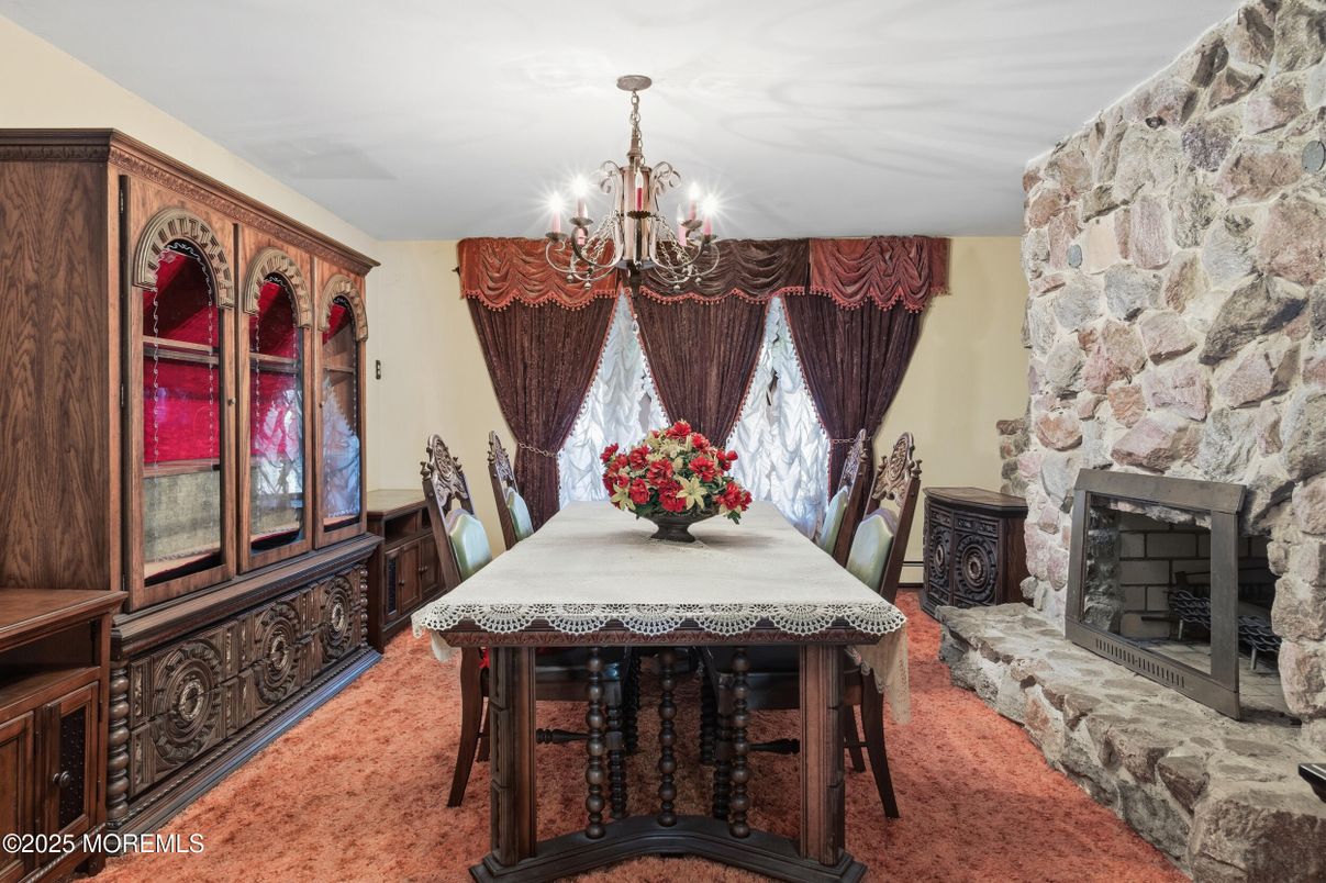 Chandelier, Dining room, Fireplace, Interior, Stone Walls