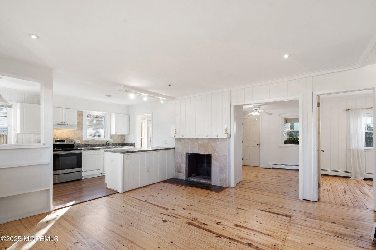 Fireplace, Interior, Kitchen, Recessed Lighting, Wood Texture Flooring