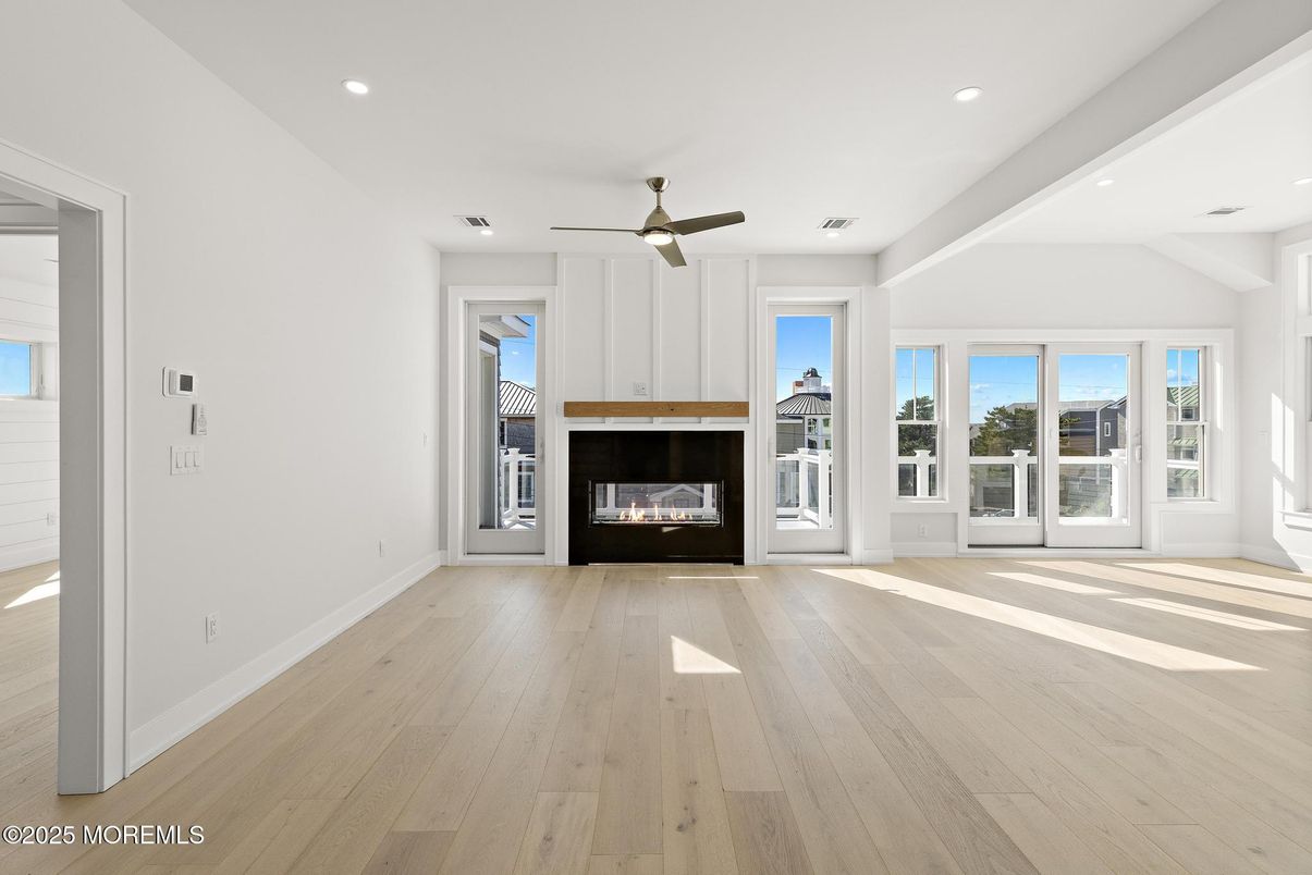Empty room, Fireplace, Interior, Recessed Lighting, Wood Texture Flooring