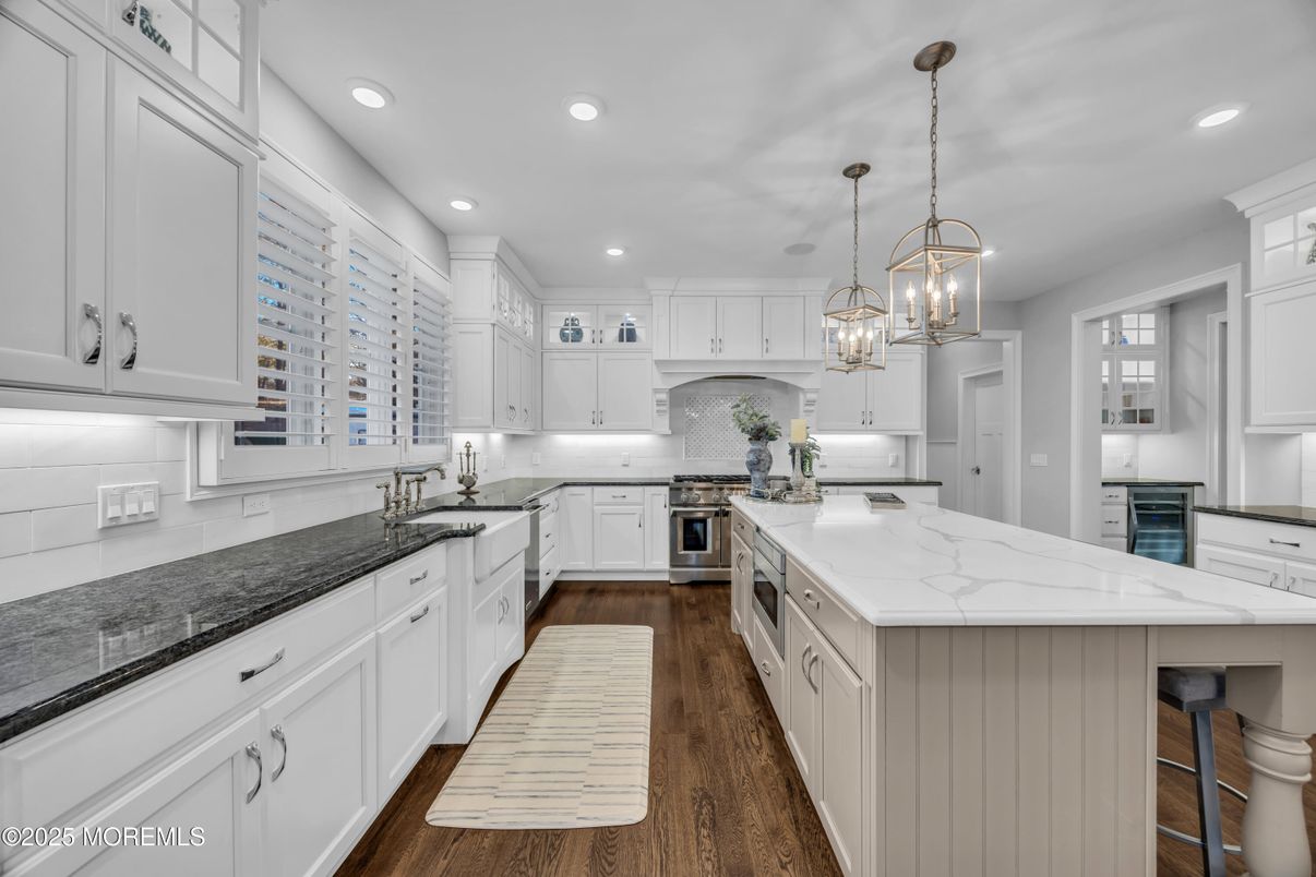 Chandelier, Interior, Kitchen, Pendant Lights, Recessed Lighting, Stainless Steel Appliances, Wood Texture Flooring