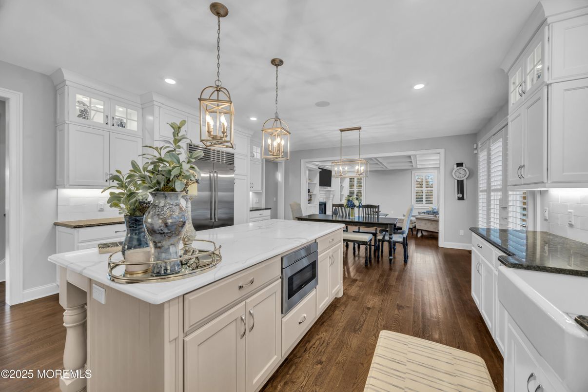 Dining room, Interior, Kitchen, Pendant Lights, Recessed Lighting, Stainless Steel Appliances, Wood Texture Flooring