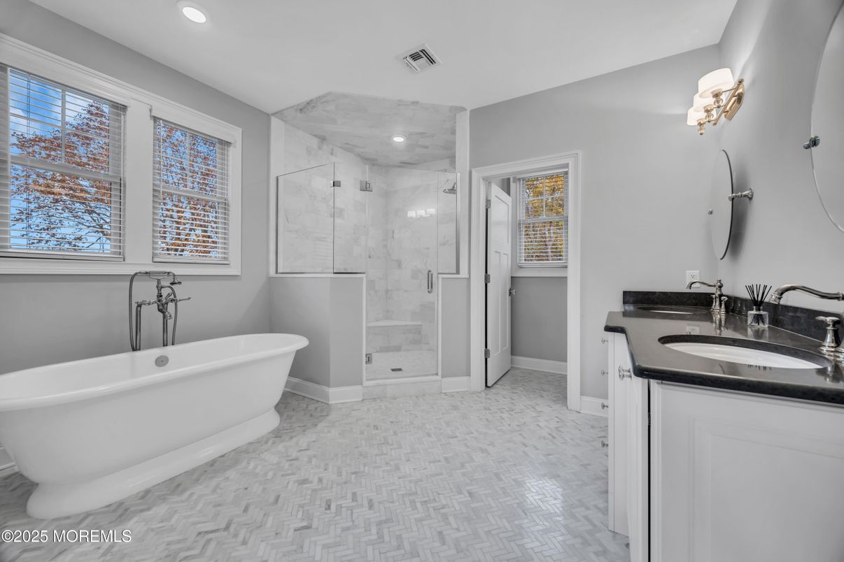 Bathroom, Dual Sink Vanities, Free Standing Baths, Glass Shower, Interior, Marble Walls, Recessed Lighting