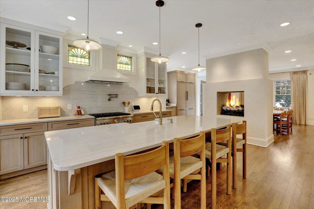 Fireplace, Interior, Kitchen, Pendant Lights, Recessed Lighting, Stainless Steel Appliances, Wood Texture Flooring