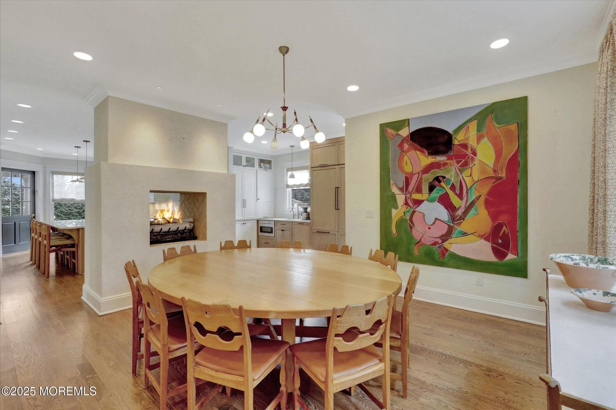 Dining room, Fireplace, Interior, Kitchen, Pendant Lights, Recessed Lighting, Wood Texture Flooring