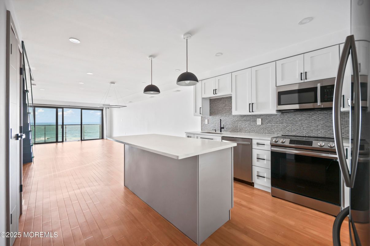 Interior, Kitchen, Pendant Lights, Recessed Lighting, Stainless Steel Appliances, Water, Wood Texture Flooring