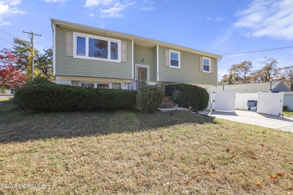 Attached, Backyard, Exterior, Facade, Raised Ranch