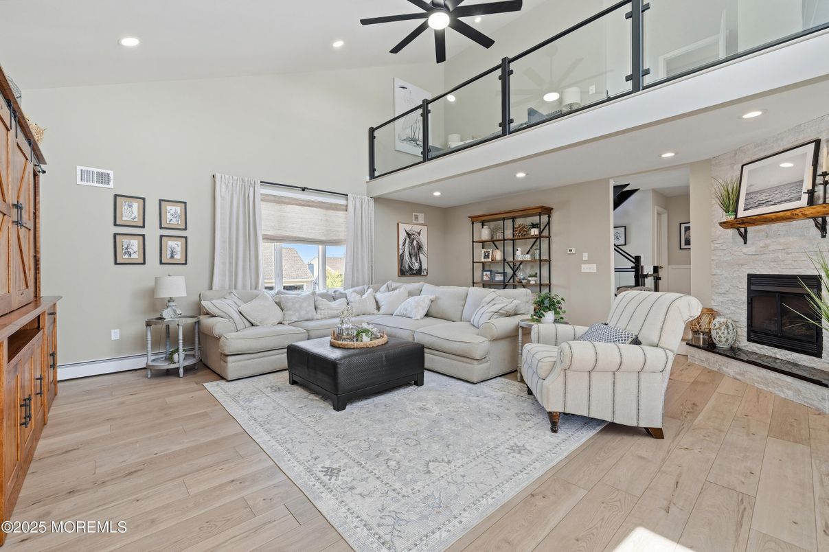 Fireplace, Interior, Living room, Recessed Lighting, Wood Texture Flooring