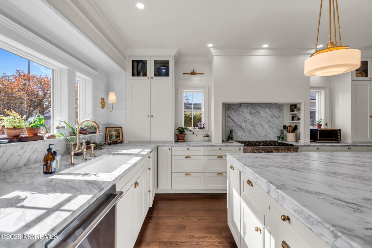 Interior, Kitchen, Marble Walls, Pendant Lights, Recessed Lighting, Stainless Steel Appliances, Wood Texture Flooring