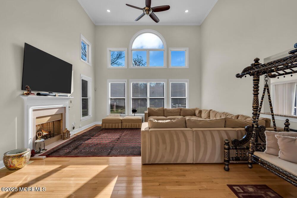 Fireplace, Fitness Equipment, Interior, Living room, Recessed Lighting, Wood Texture Flooring