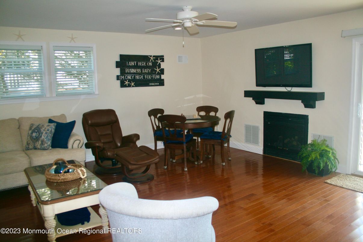 Dining room, Fireplace, Interior, Living room, Wood Texture Flooring
