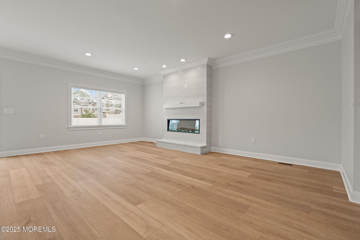 Empty room, Fireplace, Interior, Recessed Lighting, Wood Texture Flooring
