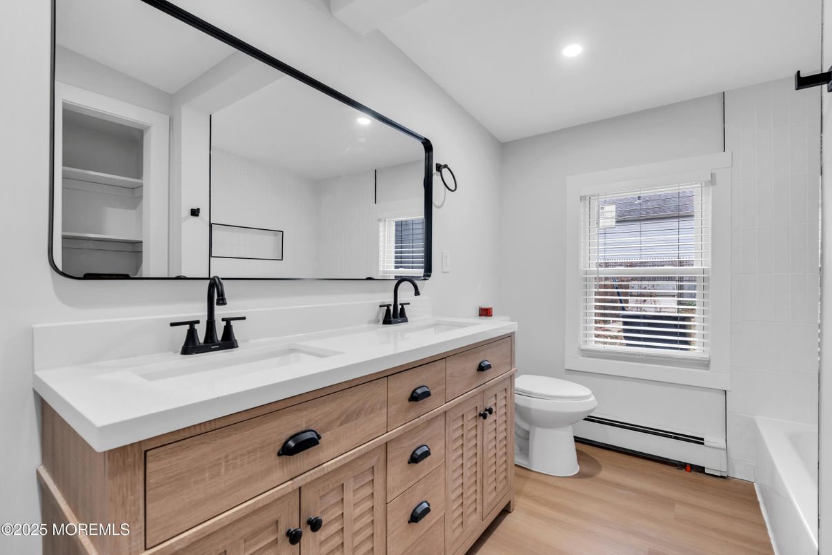 Bathroom, Dual Sink Vanities, Interior, Recessed Lighting, Wood Texture Flooring