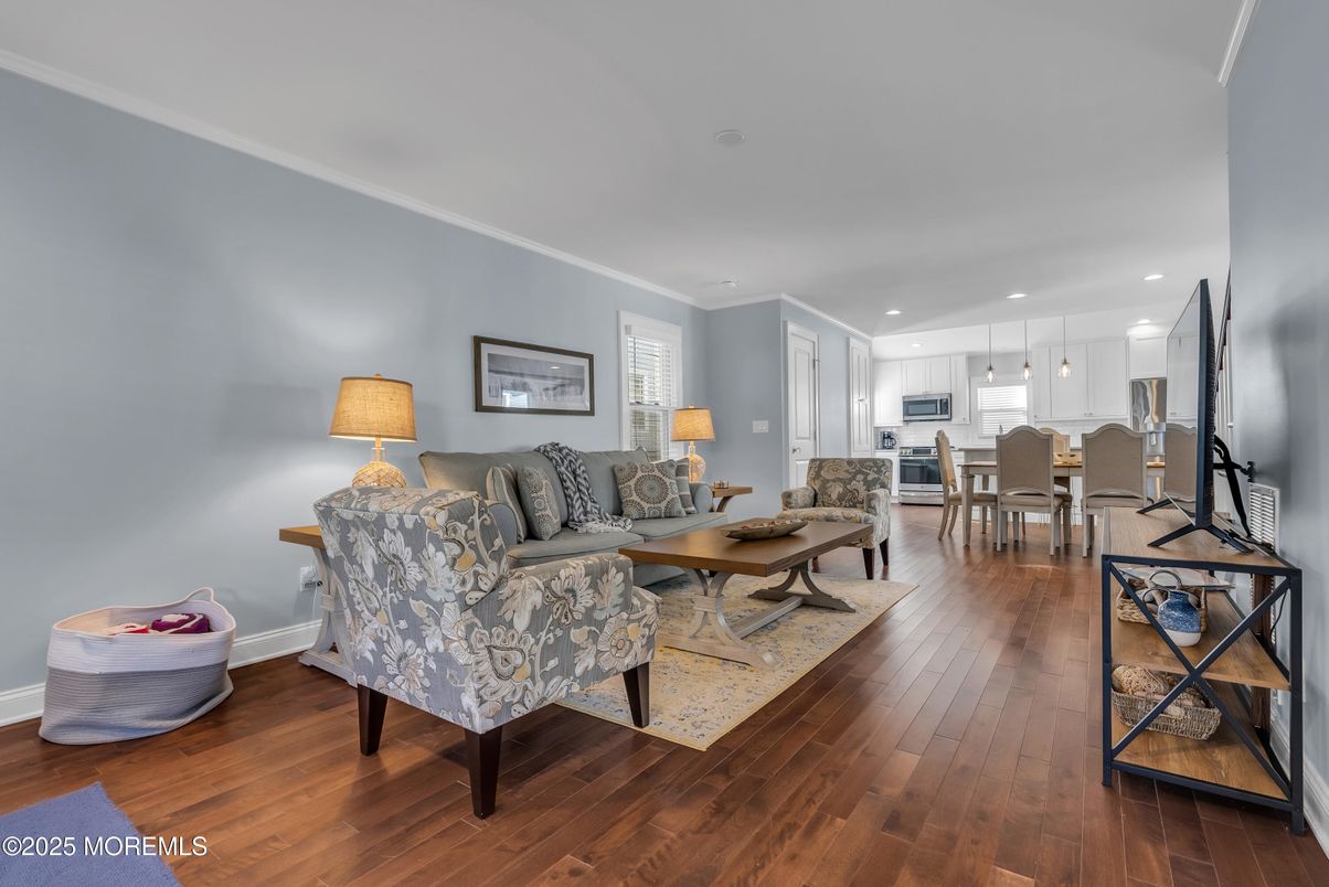 Dining room, Interior, Kitchen, Living room, Pendant Lights, Recessed Lighting, Stainless Steel Appliances, Wood Texture Flooring