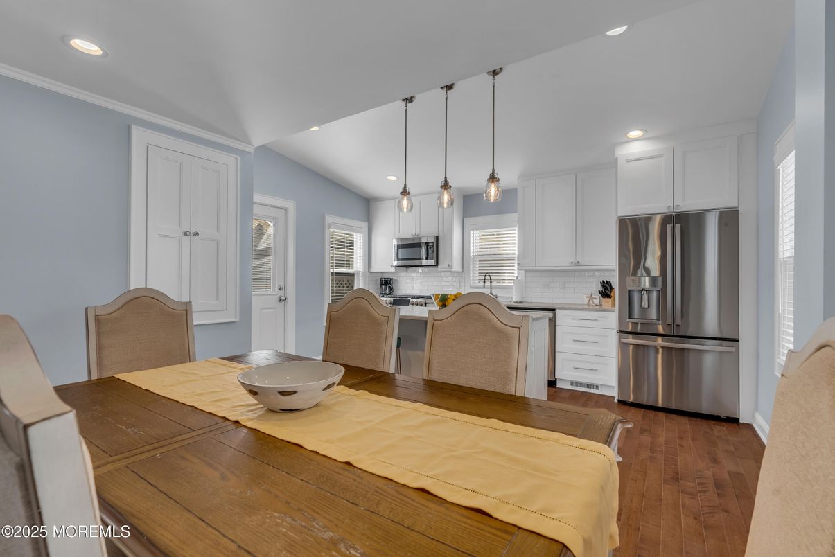Dining room, Interior, Kitchen, Pendant Lights, Recessed Lighting, Stainless Steel Appliances, Wood Texture Flooring