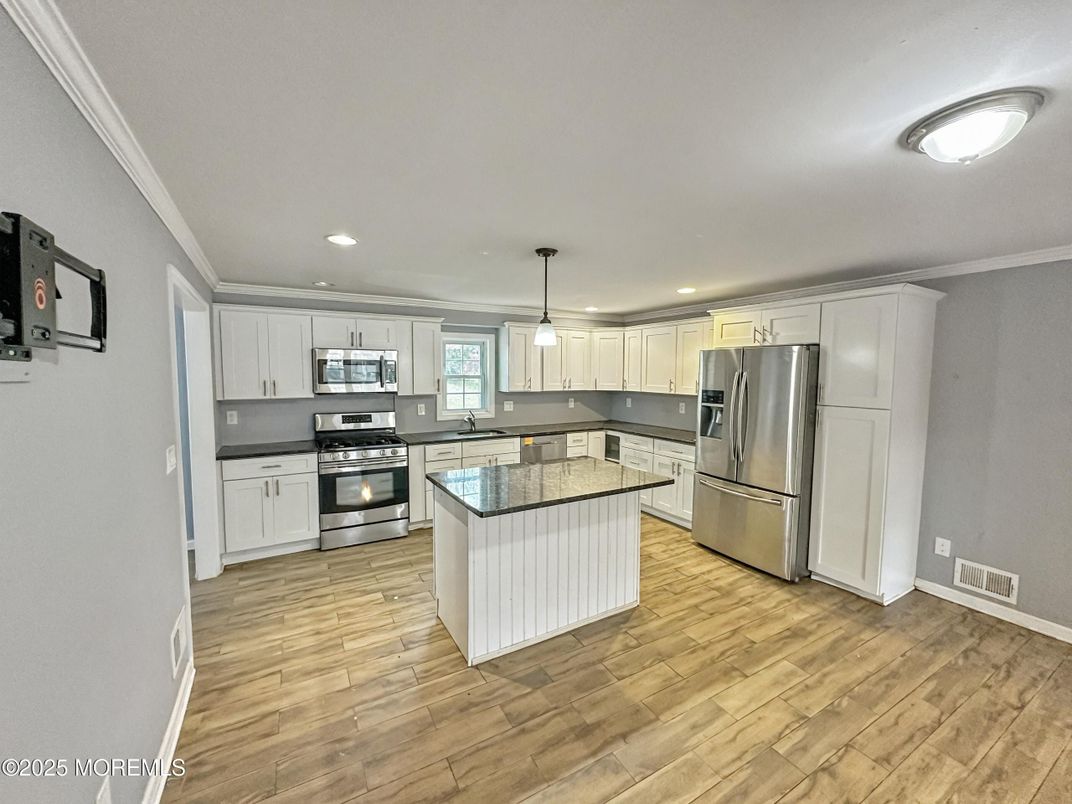 Interior, Kitchen, Pendant Lights, Recessed Lighting, Stainless Steel Appliances, Wood Texture Flooring