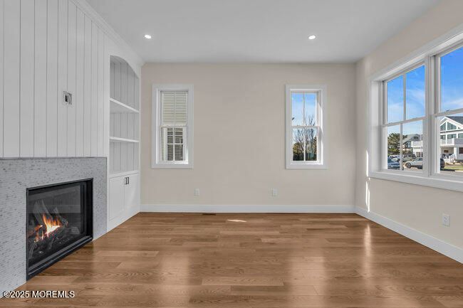 Empty room, Fireplace, Interior, Recessed Lighting, Wood Texture Flooring