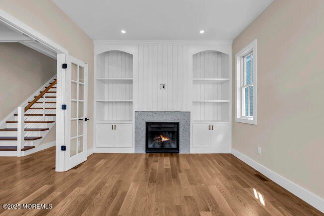 Empty room, Fireplace, Interior, Recessed Lighting, Wood Texture Flooring