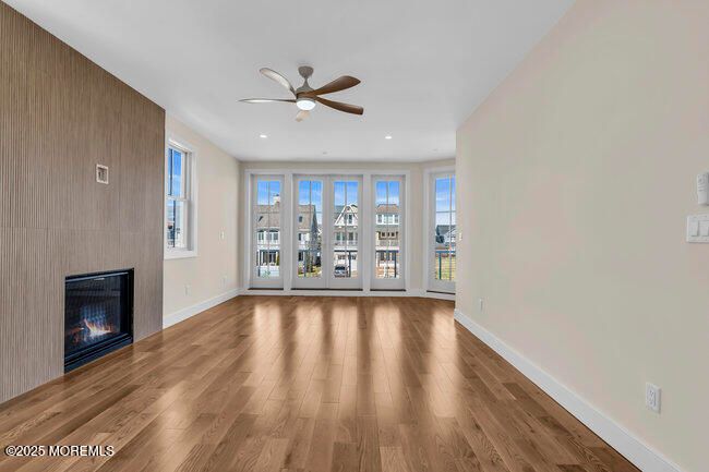 Empty room, Fireplace, Interior, Recessed Lighting, Wood Texture Flooring
