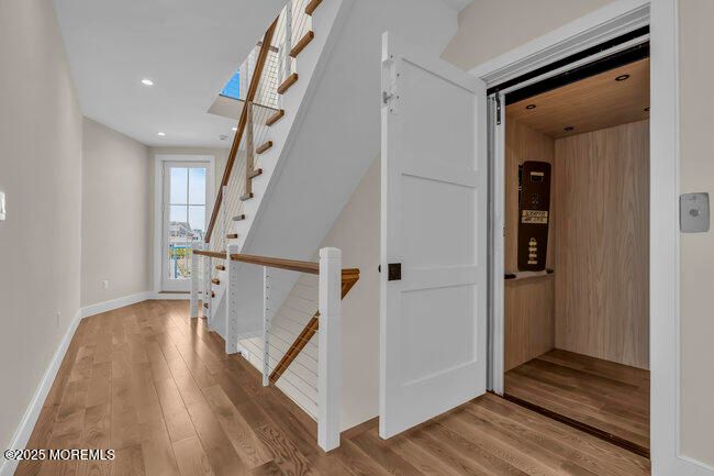 Elevator, Interior, Recessed Lighting, Wooden Ceilings, Wood Texture Flooring, Wooden Walls