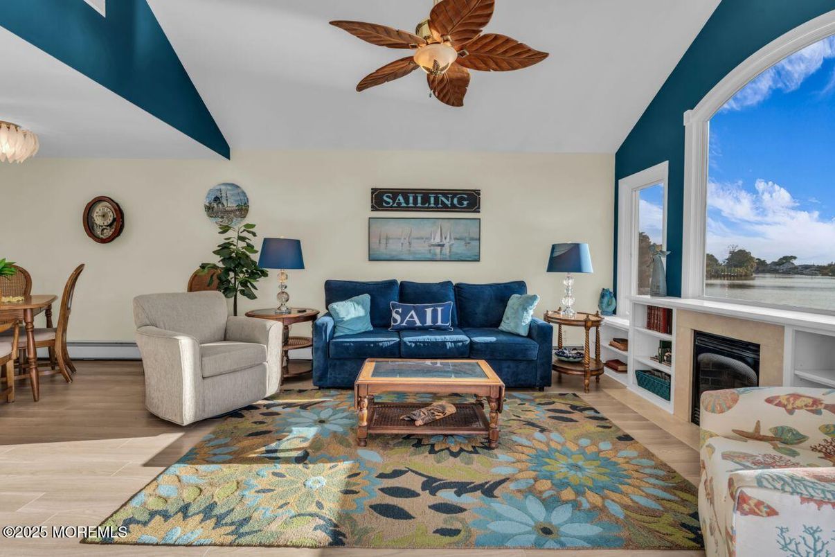 Dining room, Fireplace, Interior, Living room, Water, Wood Texture Flooring