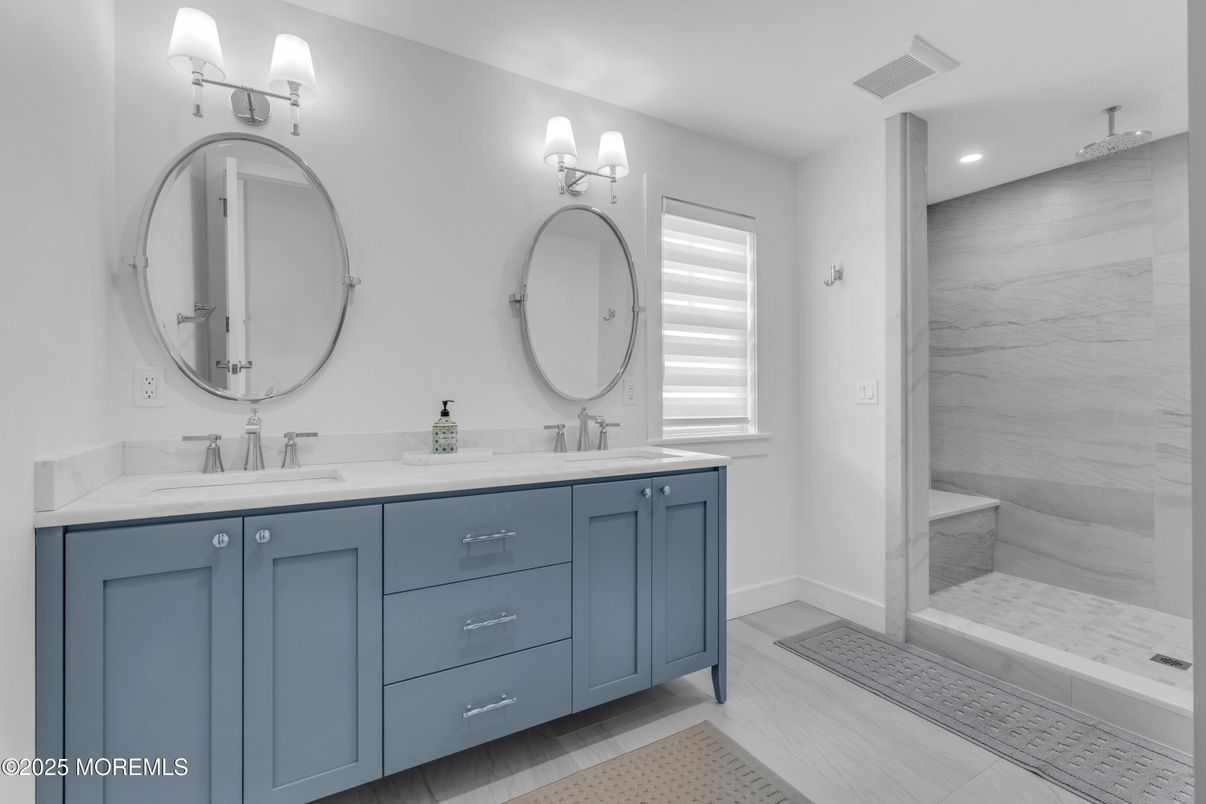 Bathroom, Dual Sink Vanities, Glass Shower, Interior, Marble Walls, Recessed Lighting