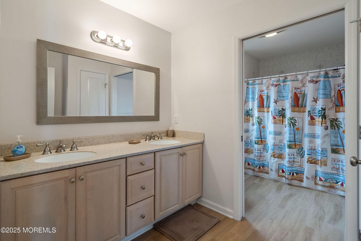 Bathroom, Dual Sink Vanities, Interior, Recessed Lighting, Wood Texture Flooring