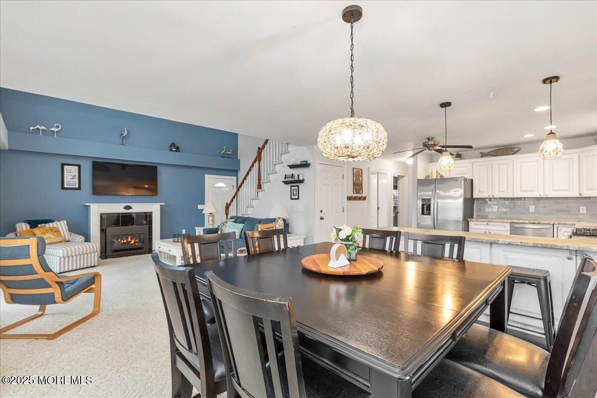 Dining room, Fireplace, Interior, Kitchen, Pendant Lights, Recessed Lighting, Stainless Steel Appliances