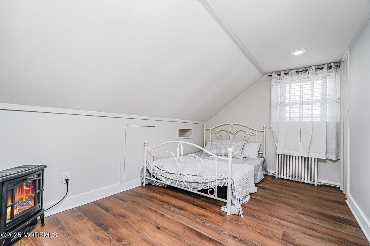 Bedroom, Fireplace, Interior, Recessed Lighting, Wood Texture Flooring