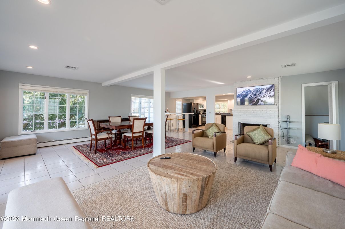 Dining room, Fireplace, Interior, Living room, Recessed Lighting, Stone Walls