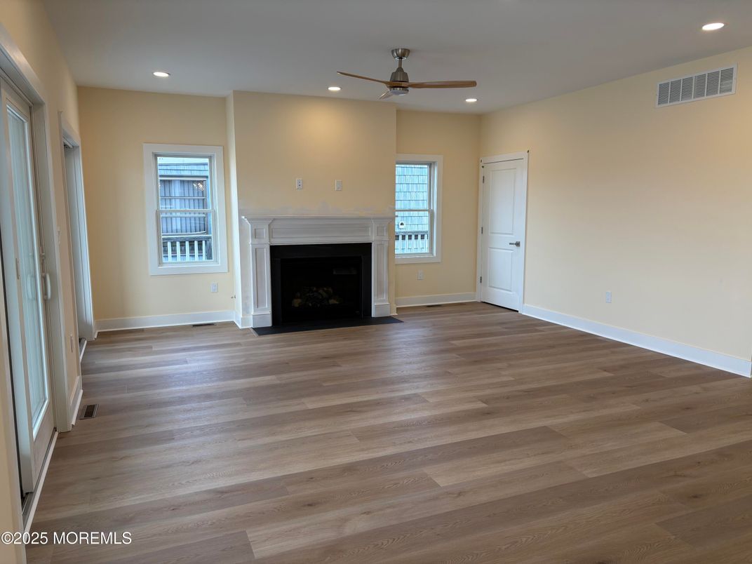 Empty room, Fireplace, Interior, Recessed Lighting, Wood Texture Flooring